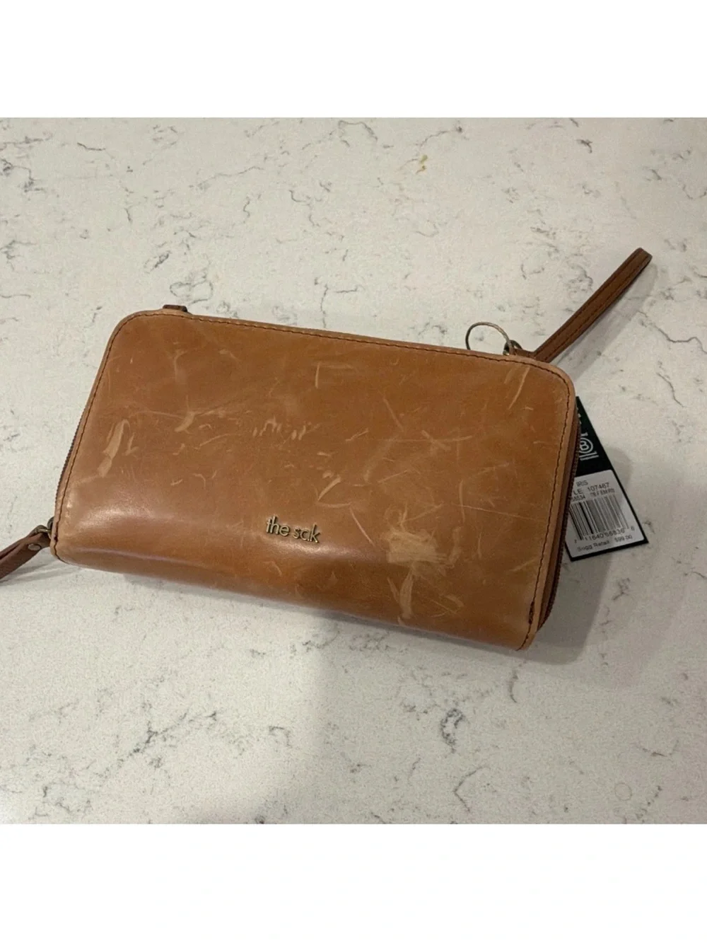 The Sak Iris Brown Floral Embossed Wristlet Zip Wallet Organizer Credit Card
